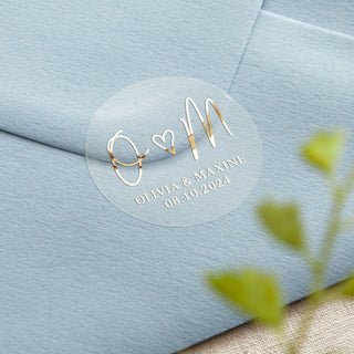 metallic gold foiled personalised wedding sticker on an envelope